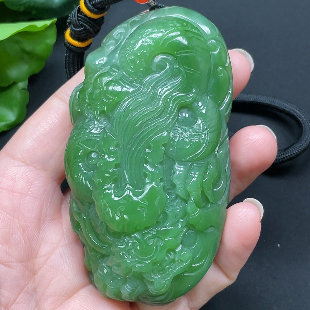 Handheld Hetian Jade Buddha sculpture from HKHQ, weighing approx. 190.73g with a rope, showcasing smooth, polished jade craftsmanship.