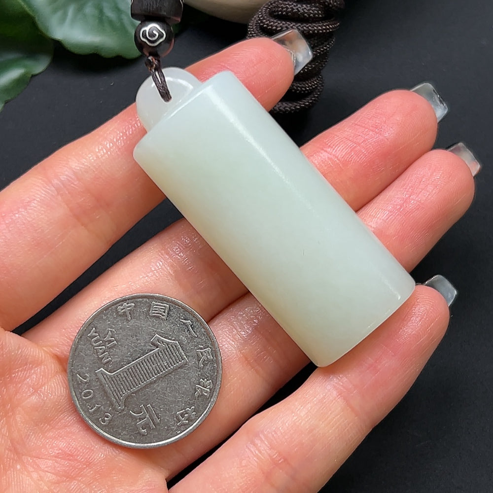 Hetian Jade bamboo tube pendant necklace by HKHQ with rope, 38.6g, featuring a smooth, polished jade pendant and adjustable cord.