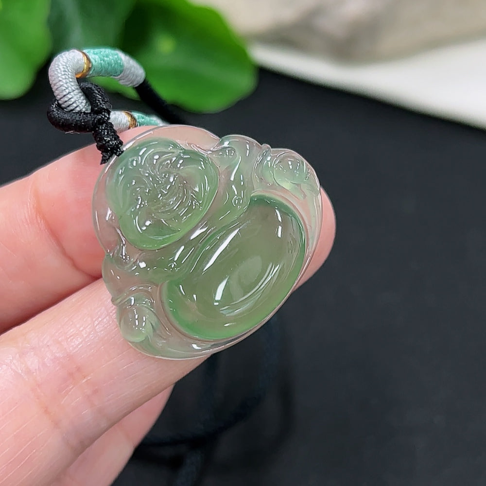 Jadeite Buddha pendant with rope, weighing approximately 9.2g, featuring a detailed Buddha figure carved from green jade.