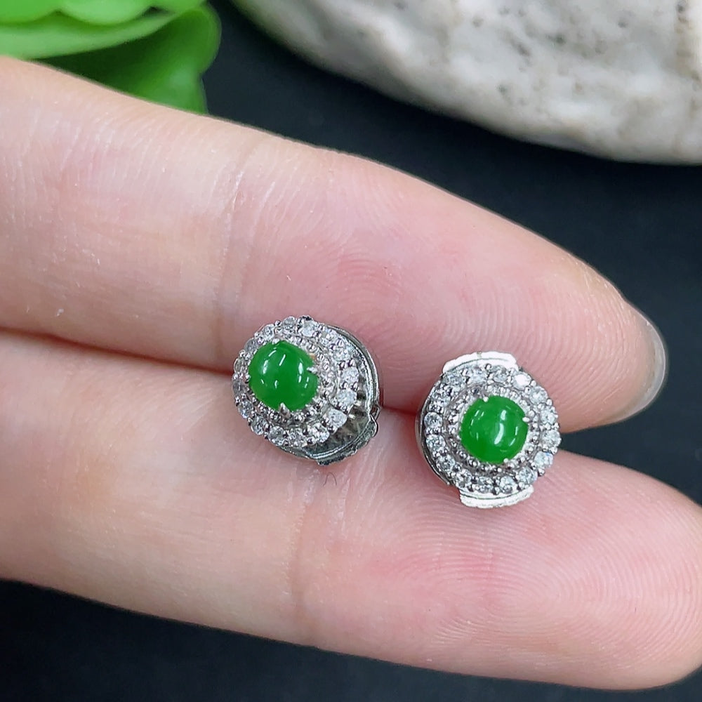 HKHQ jadeite earrings with 18k gold and diamond accents, showcasing the earrings and non-gold ear stoppers.