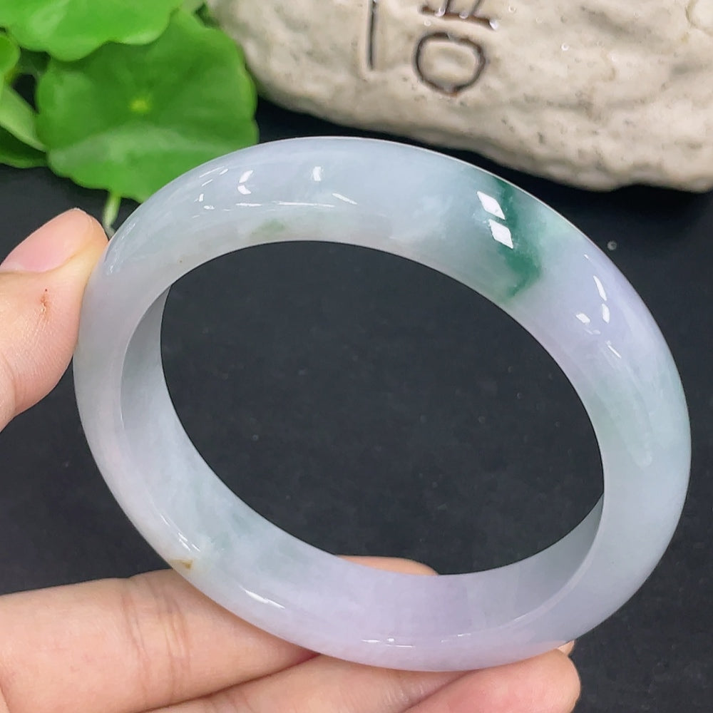 HKHQ jadeite round bangle, size 59.3, 69.5g, showcasing smooth, polished jadeite bracelet on a neutral background.