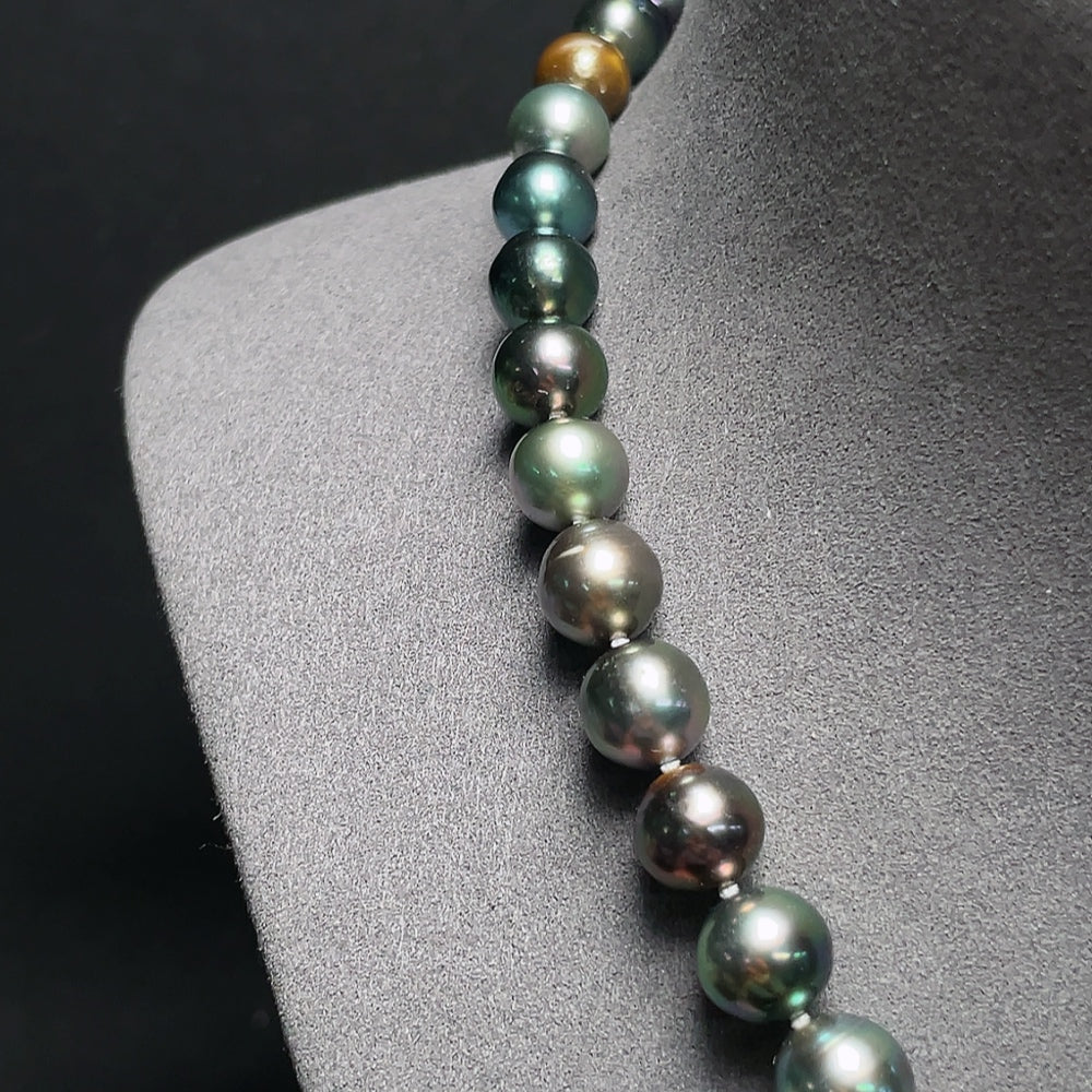 Seawater pearl necklace by HKHQ featuring 8.1-10.8mm pearls in natural color, non-gold, weighing approximately 52.81g.