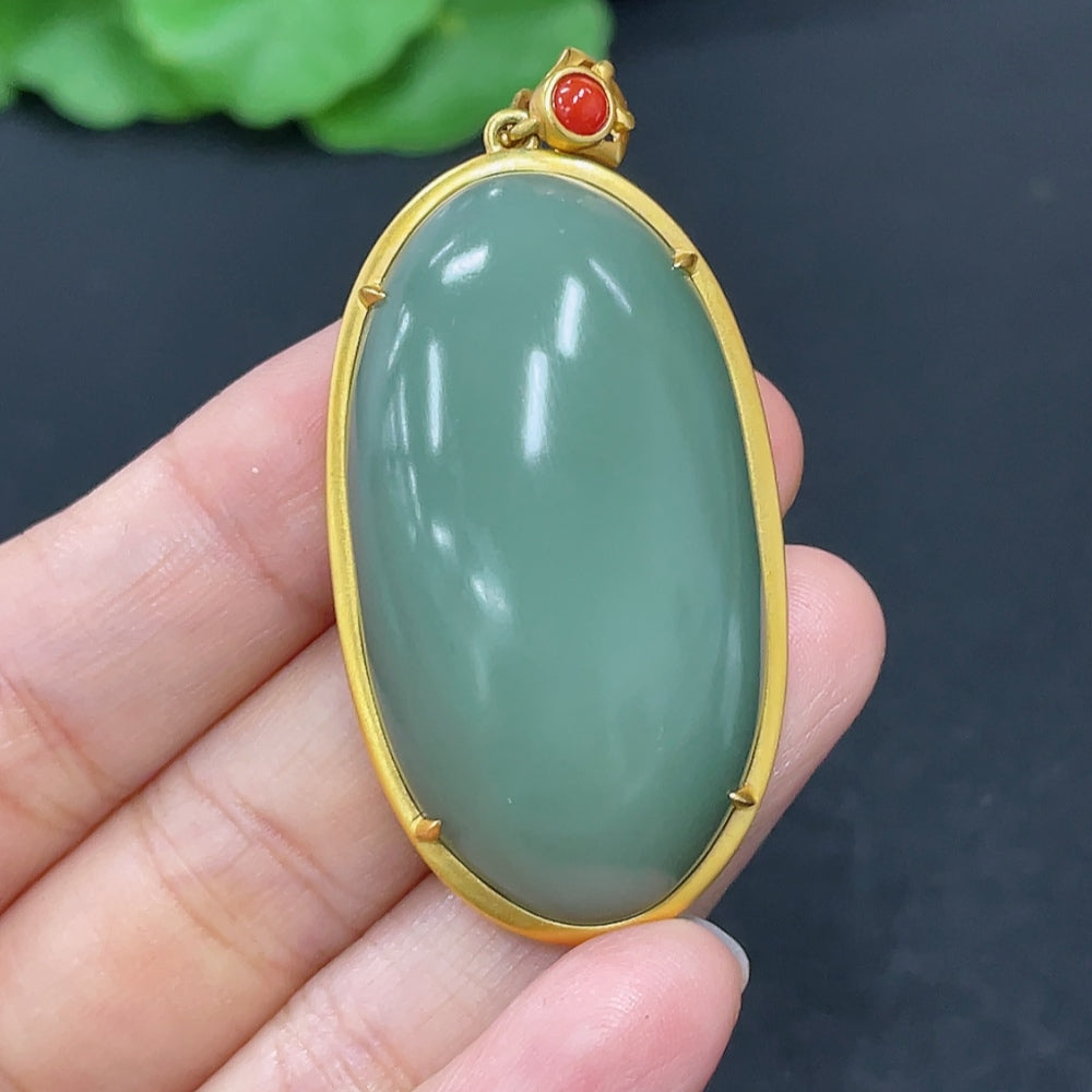 Hetian Jade cabochon pendant in 18K gold necklace, HKHQ brand, with beads, weighing approximately 21.2g, elegant jewelry piece.
