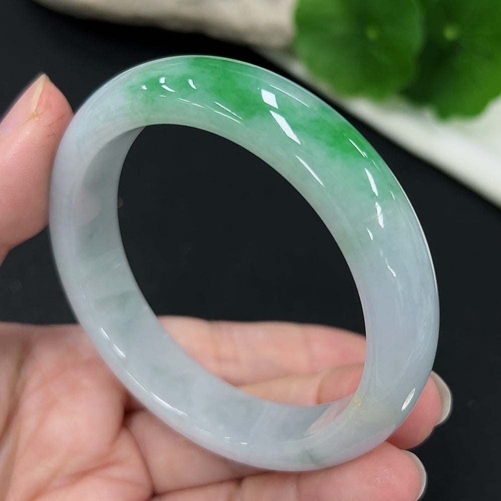 HKHQ jadeite round bracelet, size 53.8 with approximately 54g weight, featuring smooth, polished jade stones on a jewelry image.