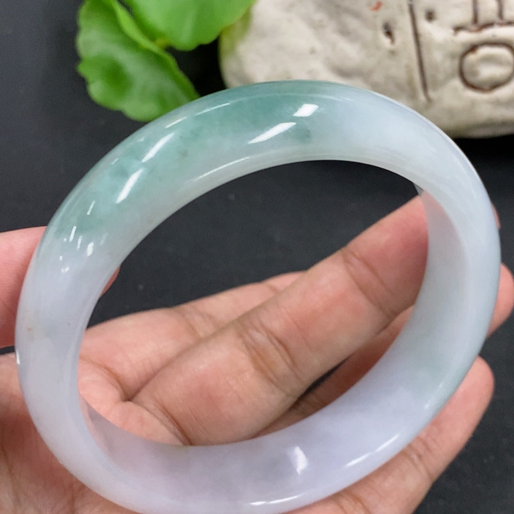 Jadeite round bracelet with a total weight of 64.3g and size 59.4, featuring smooth green jade stones.