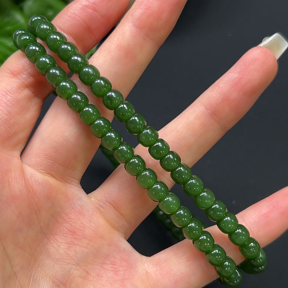 Hetian jade bead necklace by HKHQ featuring 6.2mm smooth, non-gold jade beads on a classic string.