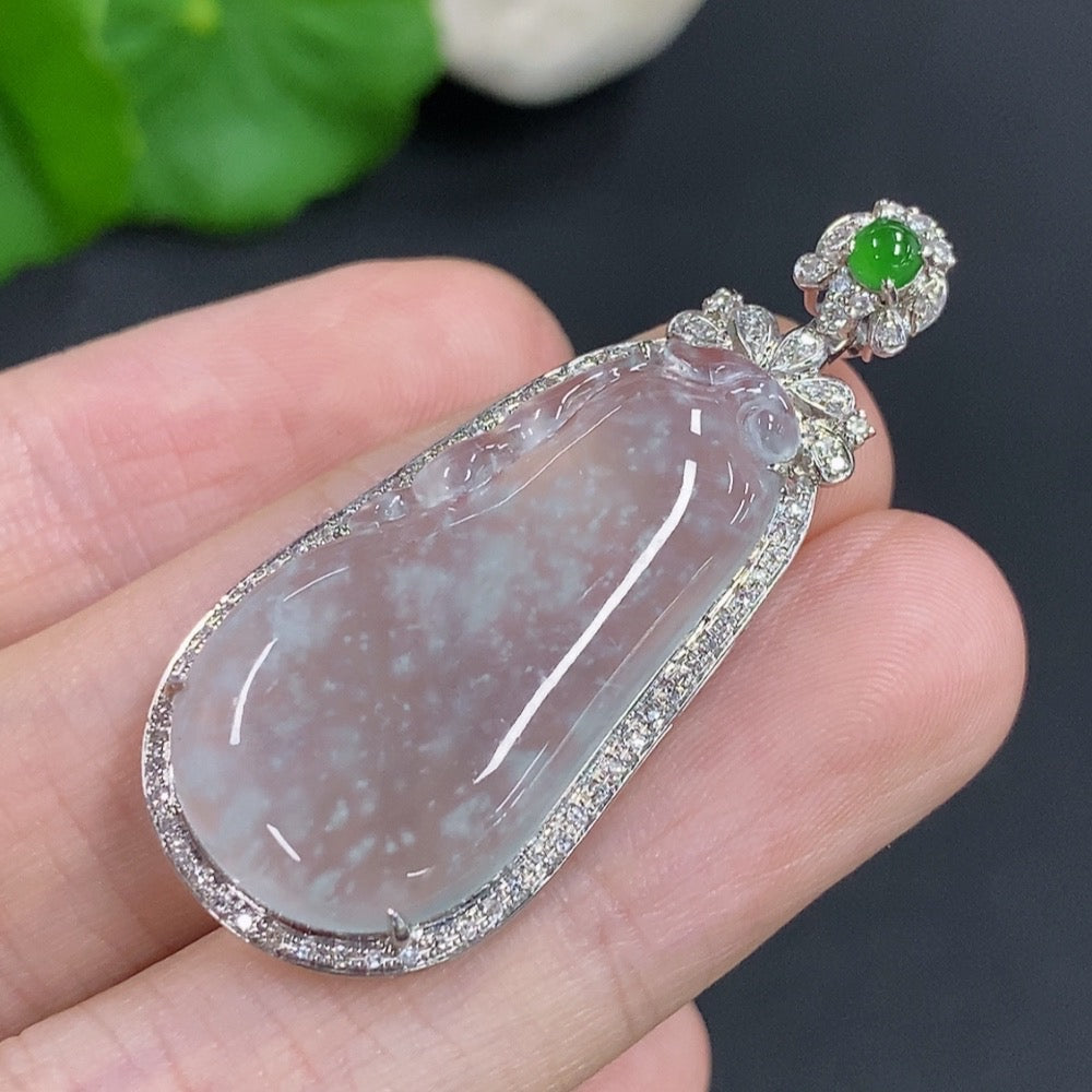 Jadeite auspicious gourd pendant with 18K gold accents and diamond details, showcasing a polished jade design.