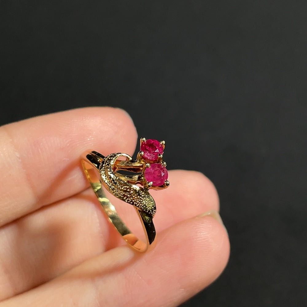 18k gold Ruby ring with a 2.8mm gemstone, weighing approx. 1.9g, size 12.5, by HKHQ featuring gemstone accents.