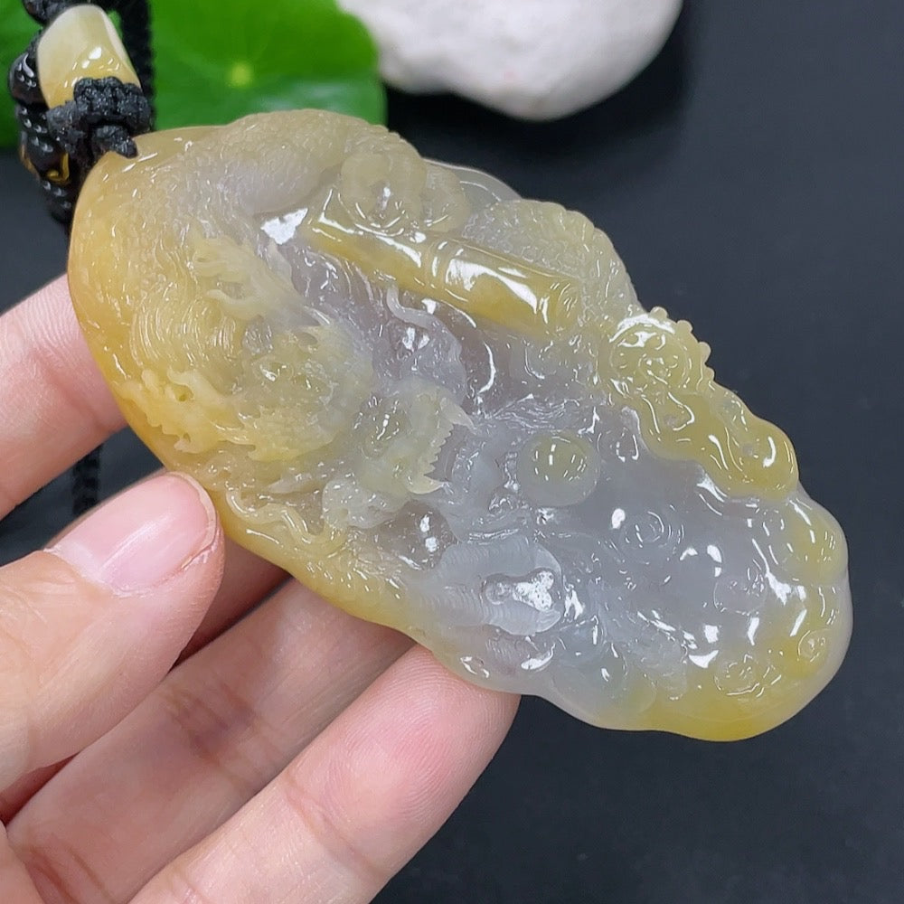 Jadeite dragon pendant with a total weight of approximately 70.5g including the cord (matching beads are non-A)