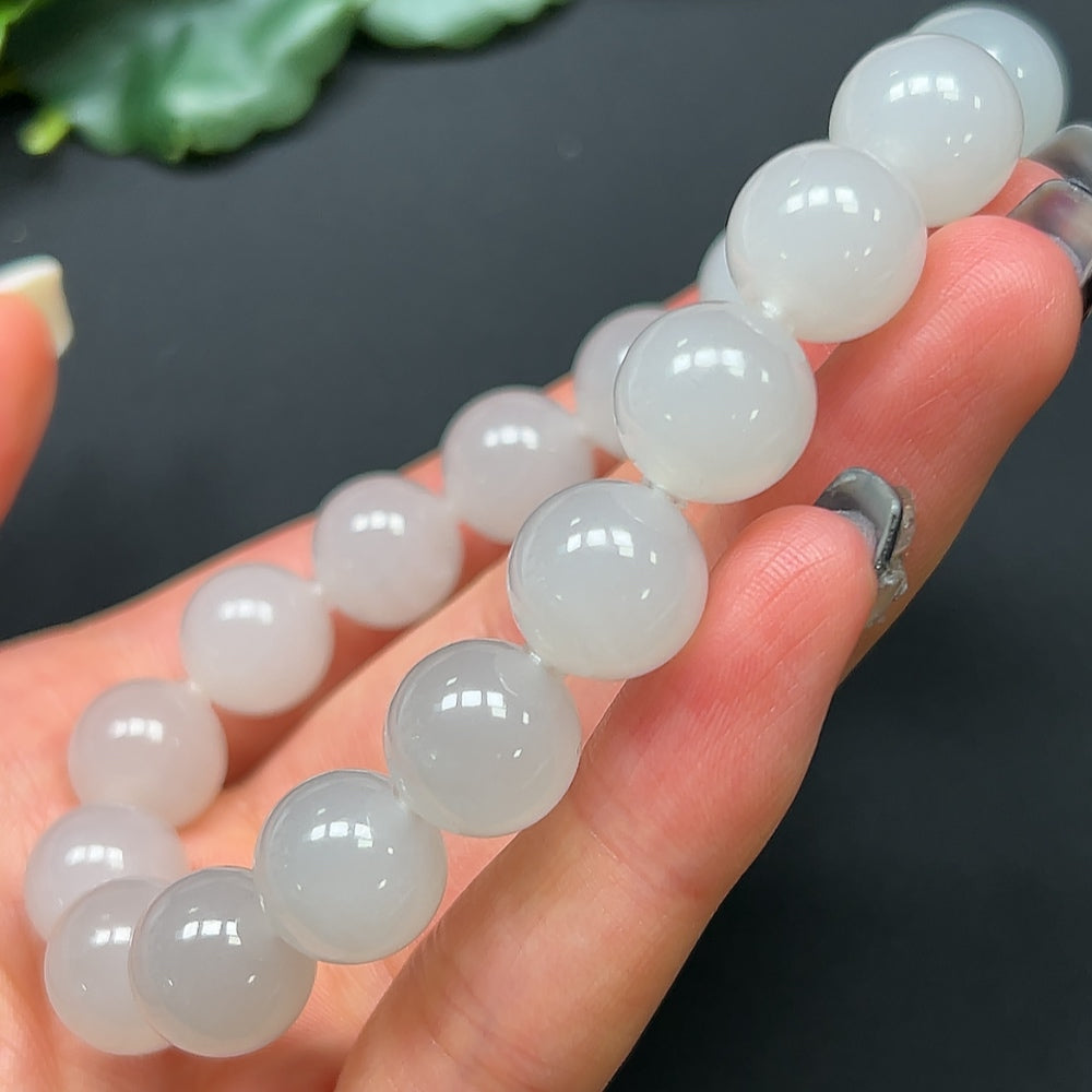 HKHQ Hetian Jade bracelet with 11.9mm beads, weighing approximately 44.52g, showcasing smooth, polished jade stones.
