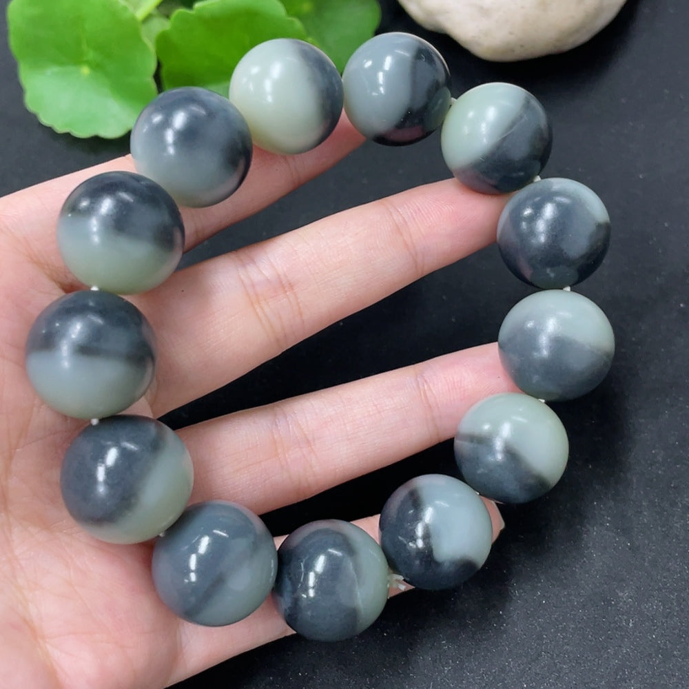 HKHQ Hetian Jade bracelet with 17.8mm beads, totaling approximately 114.9g, showcasing smooth, polished jade beads in a stylish design.