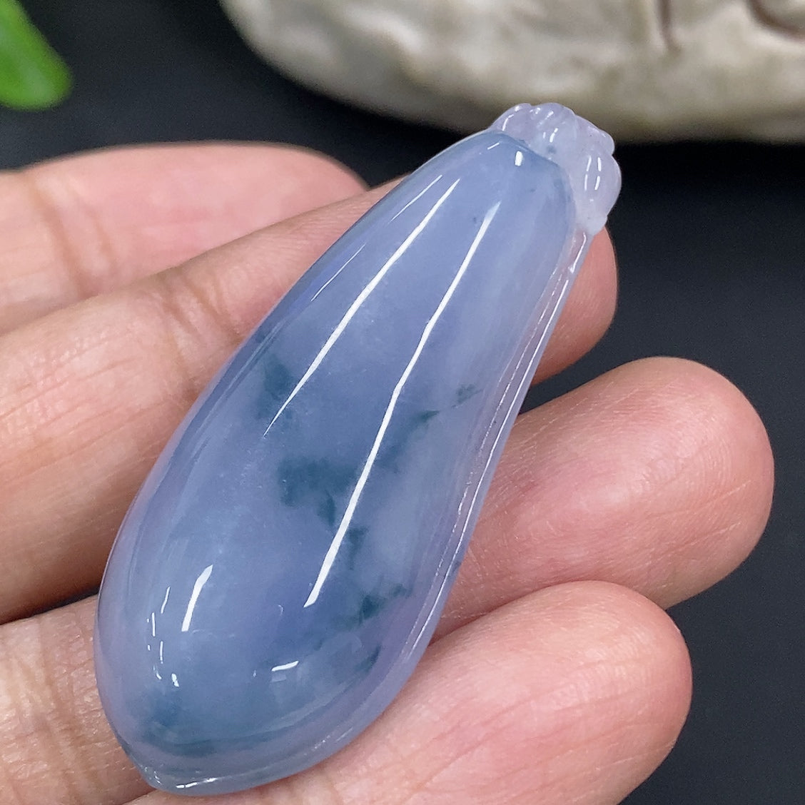 Jadeite auspicious gourd pendant from HKHQ, featuring smooth green jade with carved details, weighing approximately 10.4g.