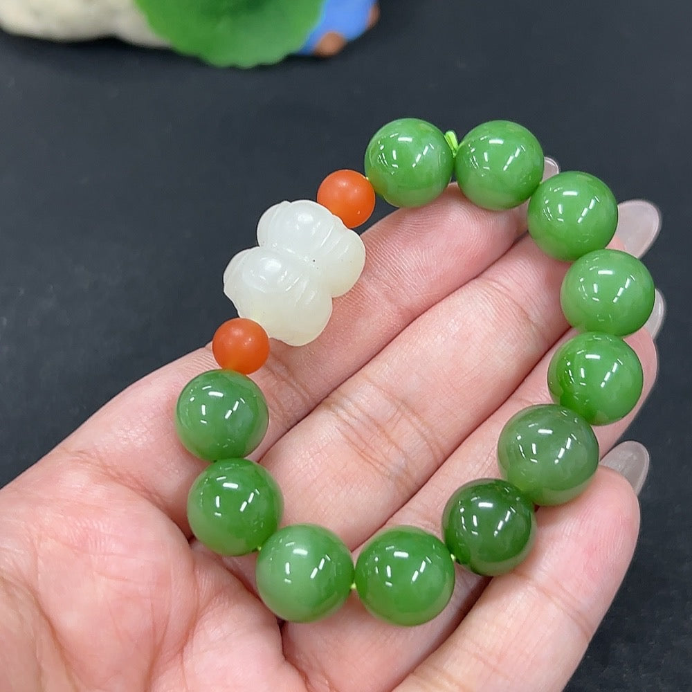 Hetian Jade Jasper bracelet with 11.7mm beads, crafted from natural jade, weighing approximately 39.3g, featuring smooth, polished stones.