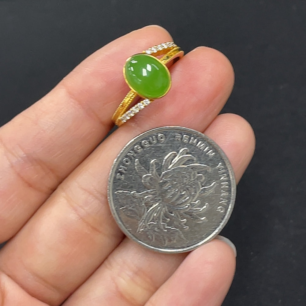 HKHQ Hetian Jade Jasper cabochon ring with 18K gold band, accented with diamonds, size 15, total weight 2.6g.