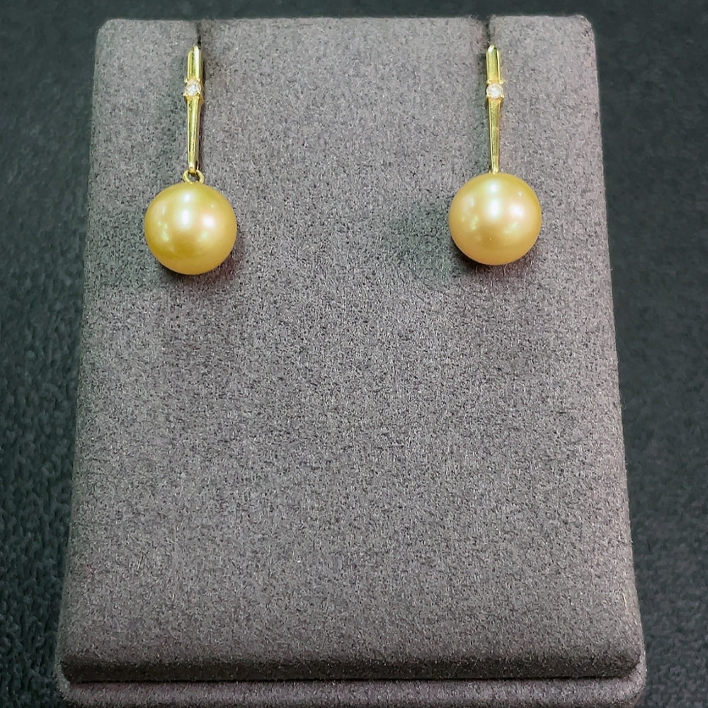 Seawater Pearl Earrings Set in 18K Gold, Approx. 9.2mm, Total Weight About 3.60g, Color Origin Undetermined, Accented with Diamonds
