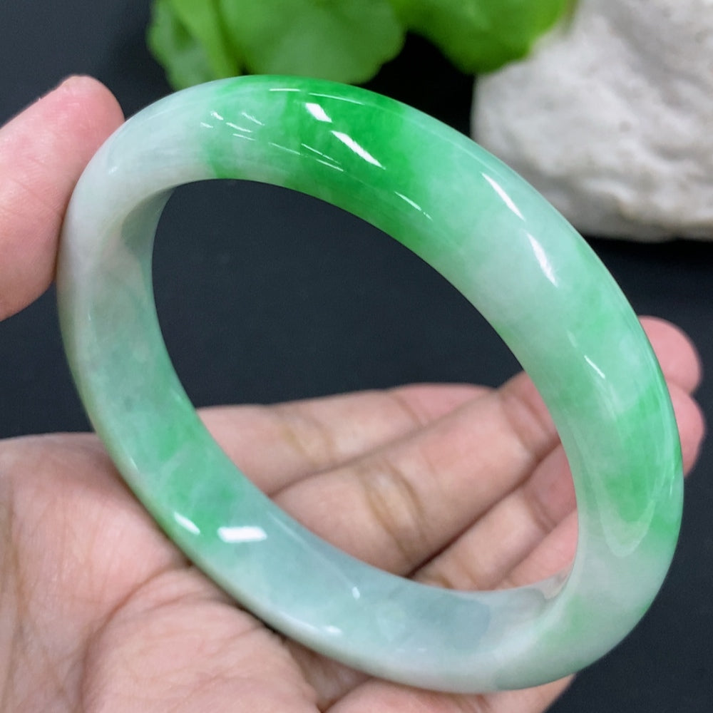 Jadeite round bracelet by HKHQ featuring smooth green jade beads, size 56.9mm, total weight approximately 54.97 grams