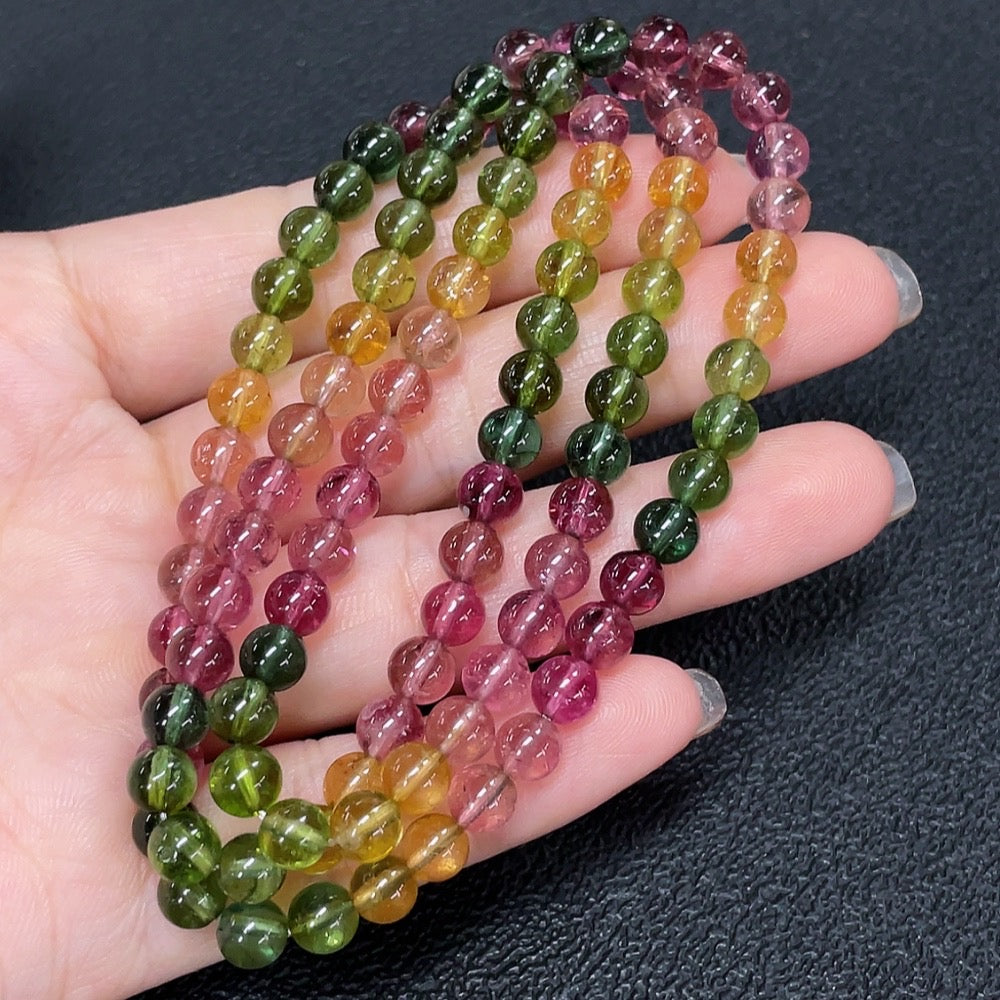 HKHQ tourmaline bead strand necklace showing vibrant multicolored round beads on a string.