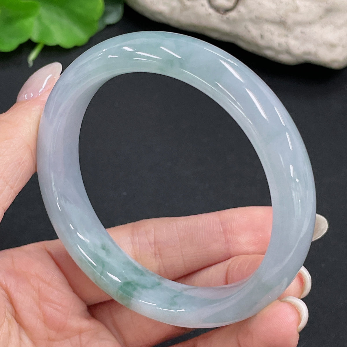 HKHQ jadeite round bangle, 54.6g weight, size 56.3, crafted from smooth green jade, displayed on a neutral background.