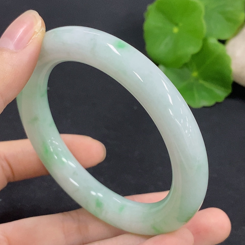 HKHQ jadeite round bangle in size 56, weighing approximately 62.4g, showcasing smooth, polished jadeite with a glossy finish.