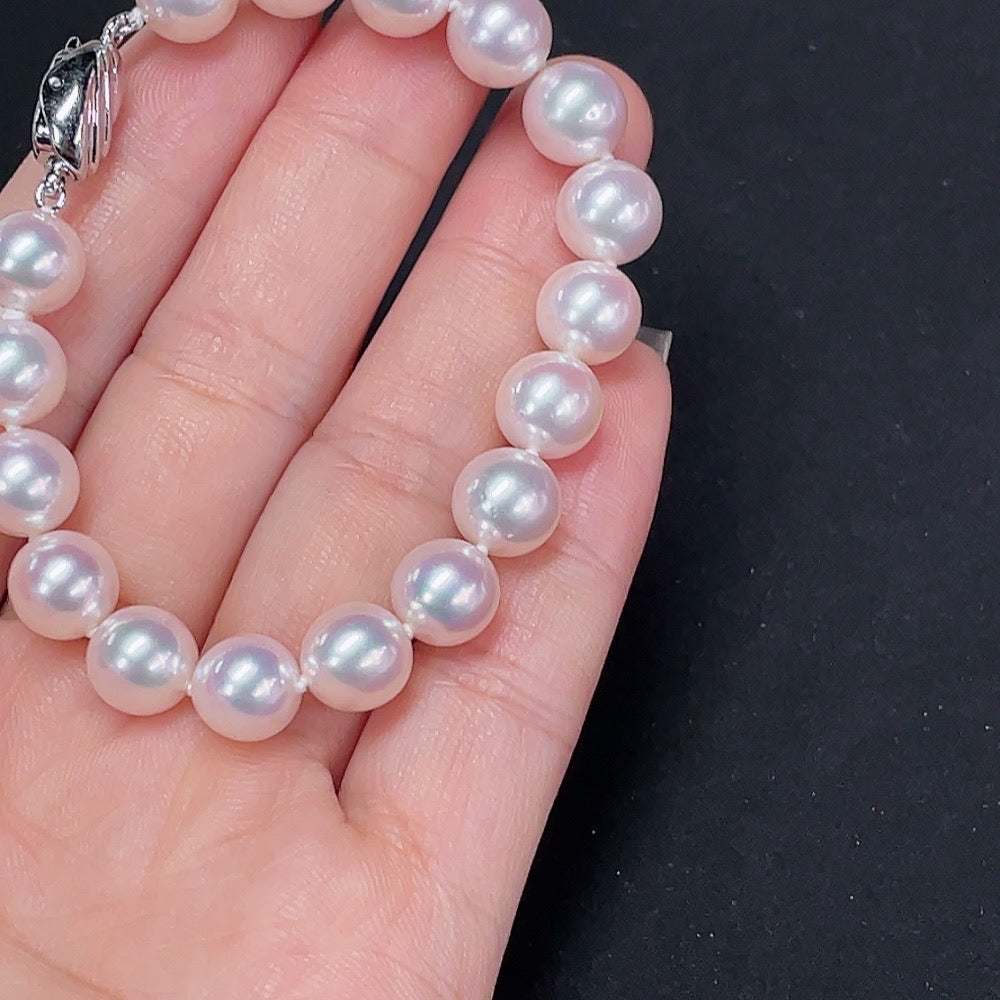 Saltwater pearl bracelet by HKHQ featuring elegant white pearls on a non-gold bracelet, perfect for sophisticated style.