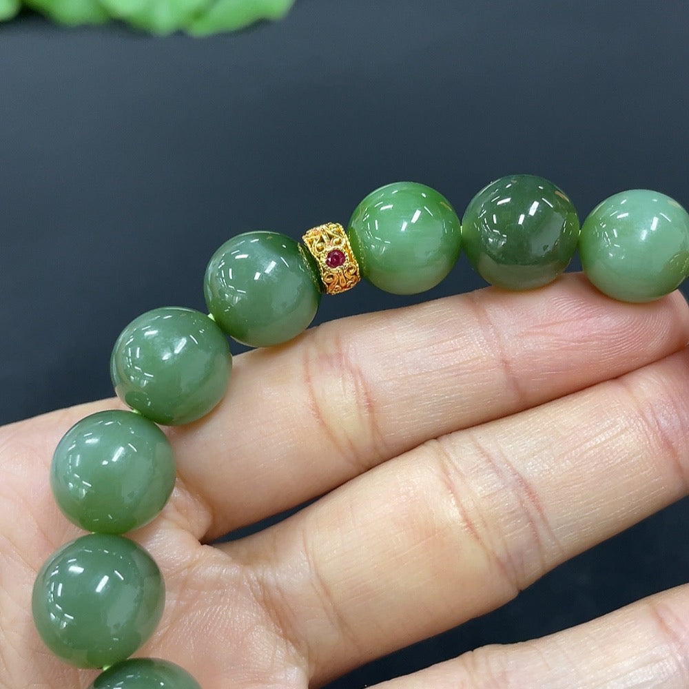 HKHQ Hetian Jade Jasper bracelet with 11.8mm beads, gold-plated red accents, and 18k gold details, weight about 44g.