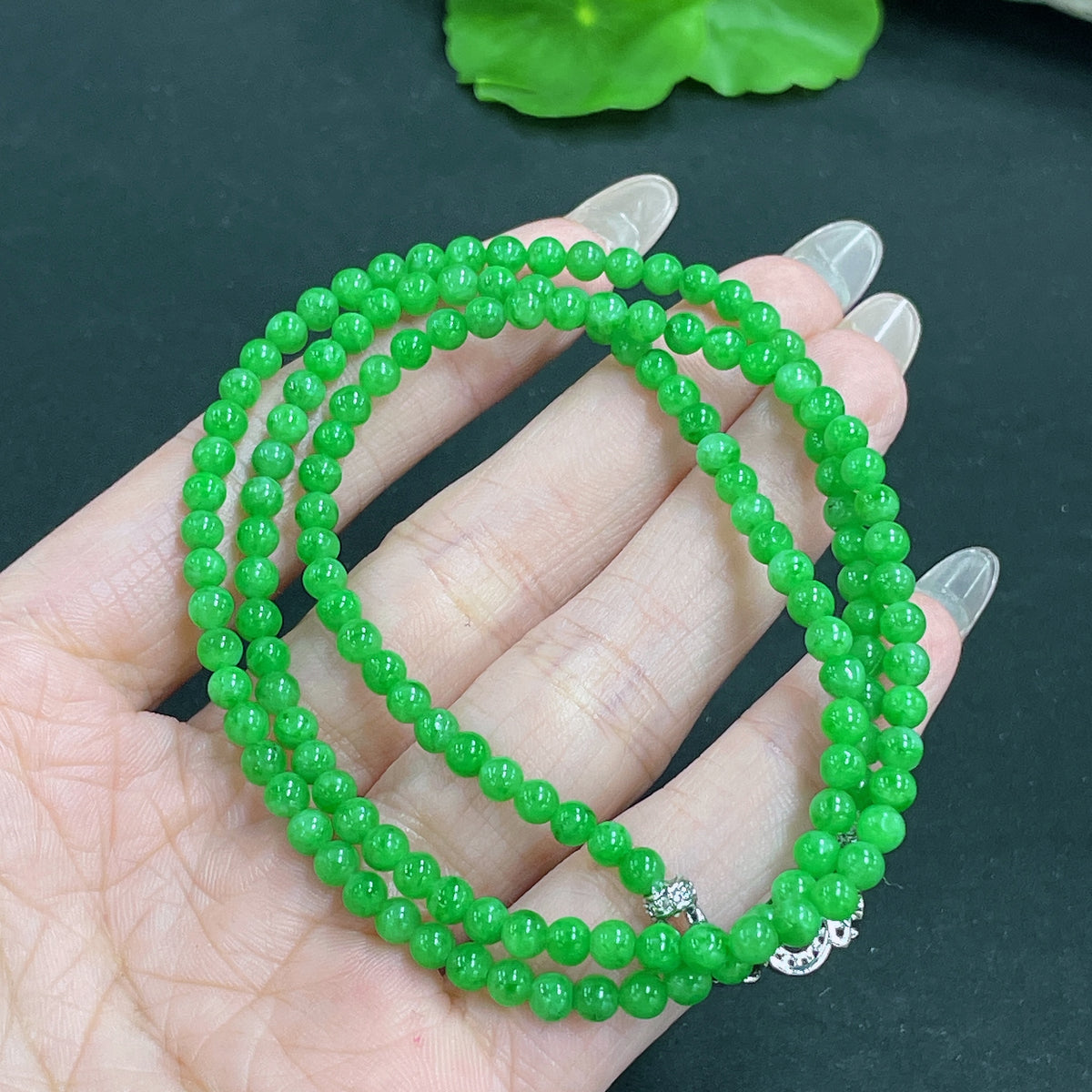 Jadeite bead necklace with 4mm jade beads, non-gold, weighing approximately 16.74g, featuring smooth, round jade stones.