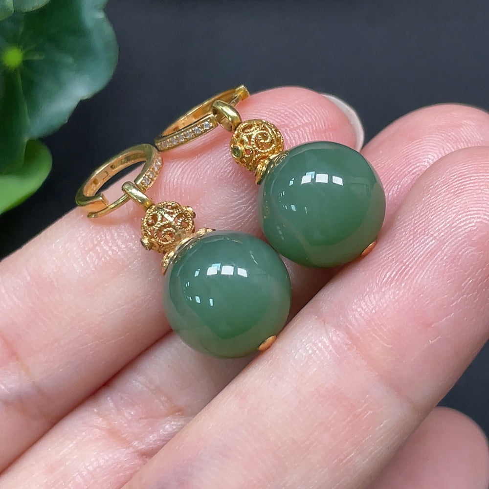 HKHQ Hetian jade earrings with 18K gold and diamond accents, 11.6mm size, and a total weight of 6.79g, elegant jewelry piece