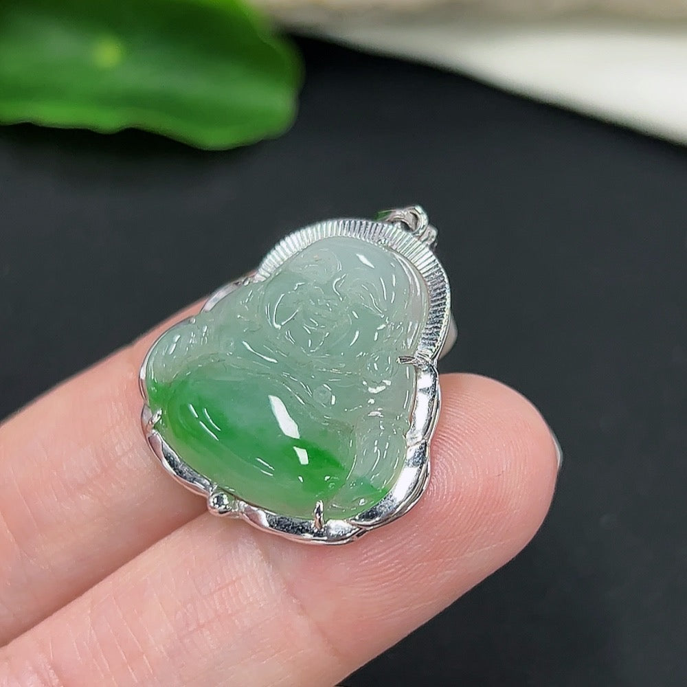 Jadeite Buddha pendant with 18k gold setting, hanging on a necklace, showcasing the detailed carved jadeite and gold craftsmanship.