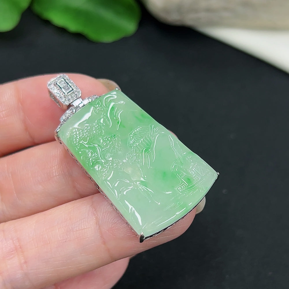 Jadeite landscape pendant with 18K gold and diamond accents, weighing approximately 9.7g, featuring detailed jade craftsmanship.