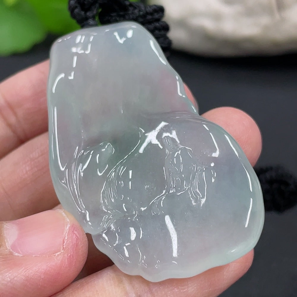 Jadeite Guanyin pendant featuring a formless design, crafted from green jade, with intricate carvings, by HKHQ.