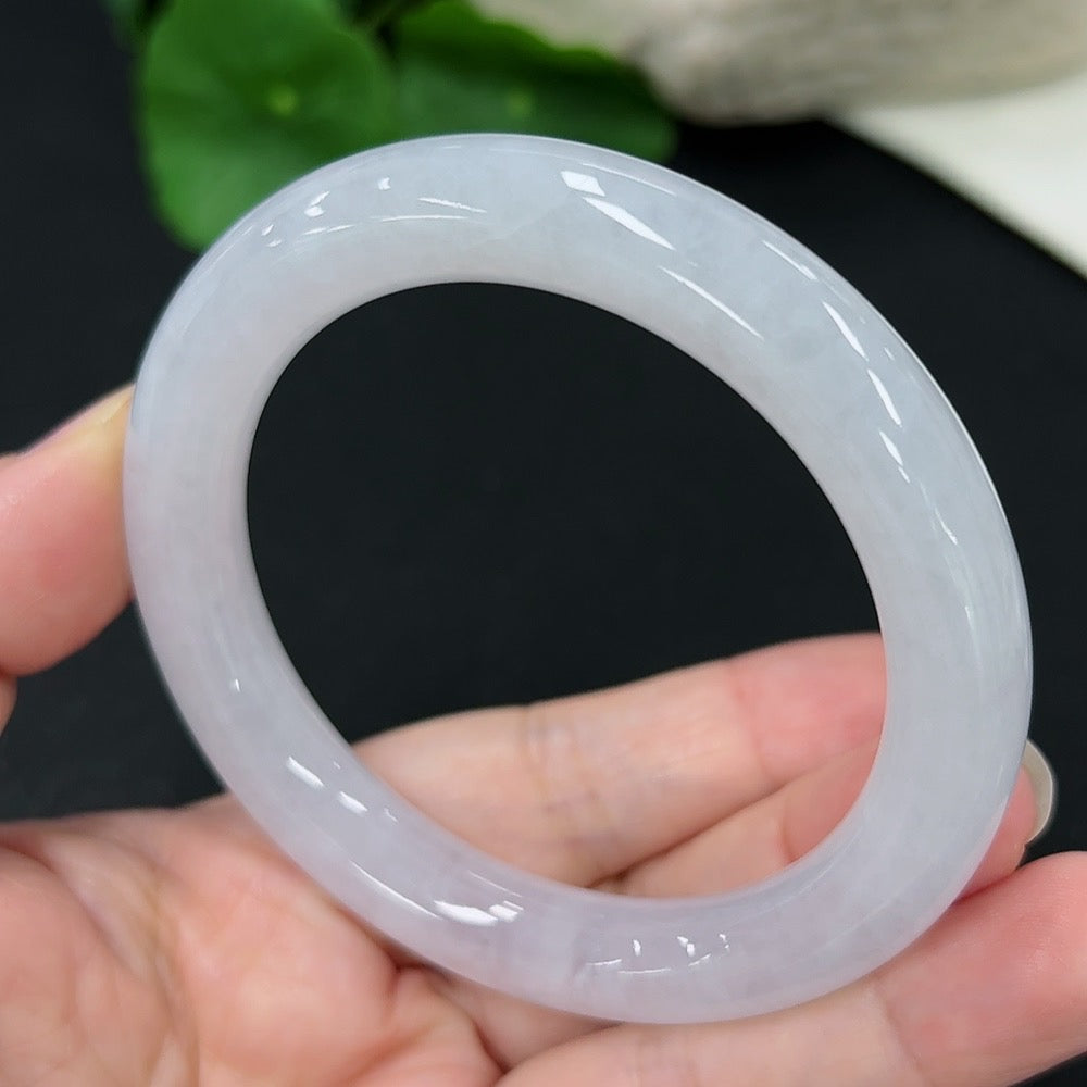 HKHQ jadeite round bangle size 55 with approximately 53.33g weight, showcasing smooth green jade surface and polished finish.