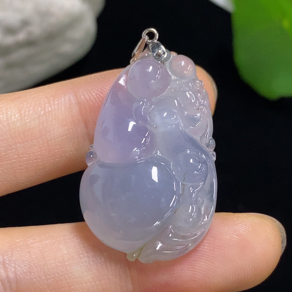 Jadeite gourd pendant with 18k gold accents, approximately 10g, crafted by HKHQ, showcasing smooth green jade and detailed design.