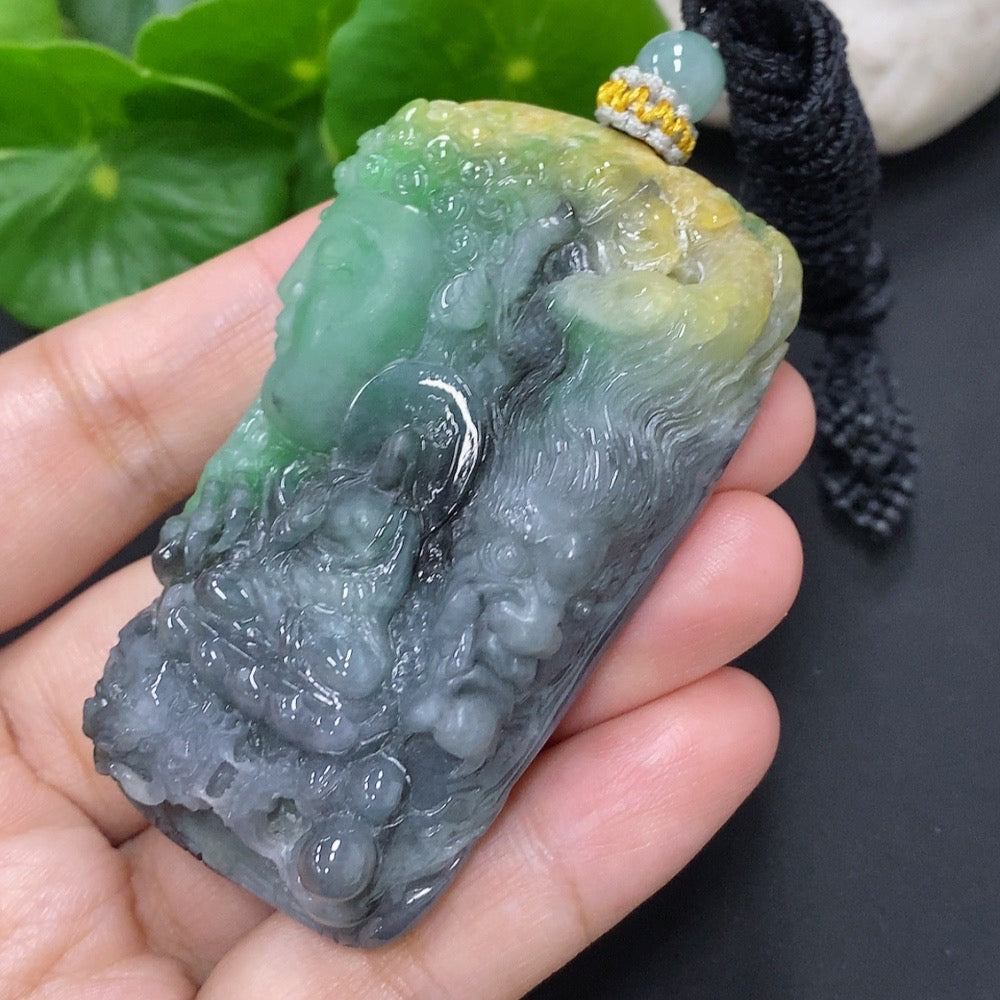 Jadeite pendant of Momentary Thought with rope, weighing approximately 70.8g, featuring smooth green jade and intricate design.