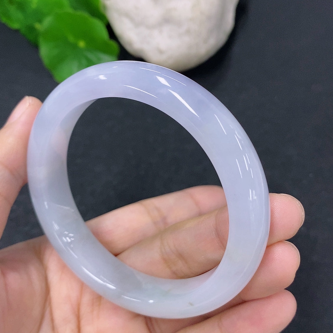 HKHQ jadeite round bangle with 53.8mm diameter, weighing approximately 49.63g, showcasing smooth, polished jadeite surface.