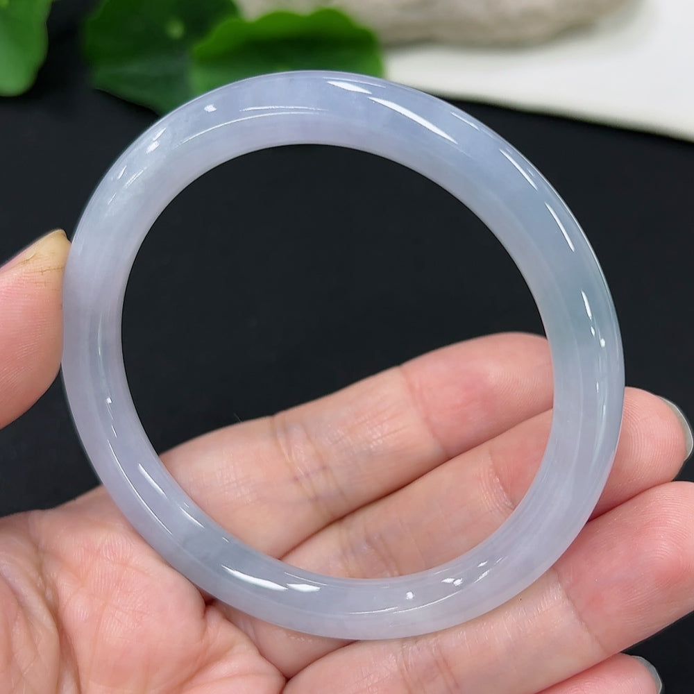 Jadeite round bangle in size 54.7 with a total weight of 27.7g, showcasing smooth, polished green jade bracelet from HKHQ.