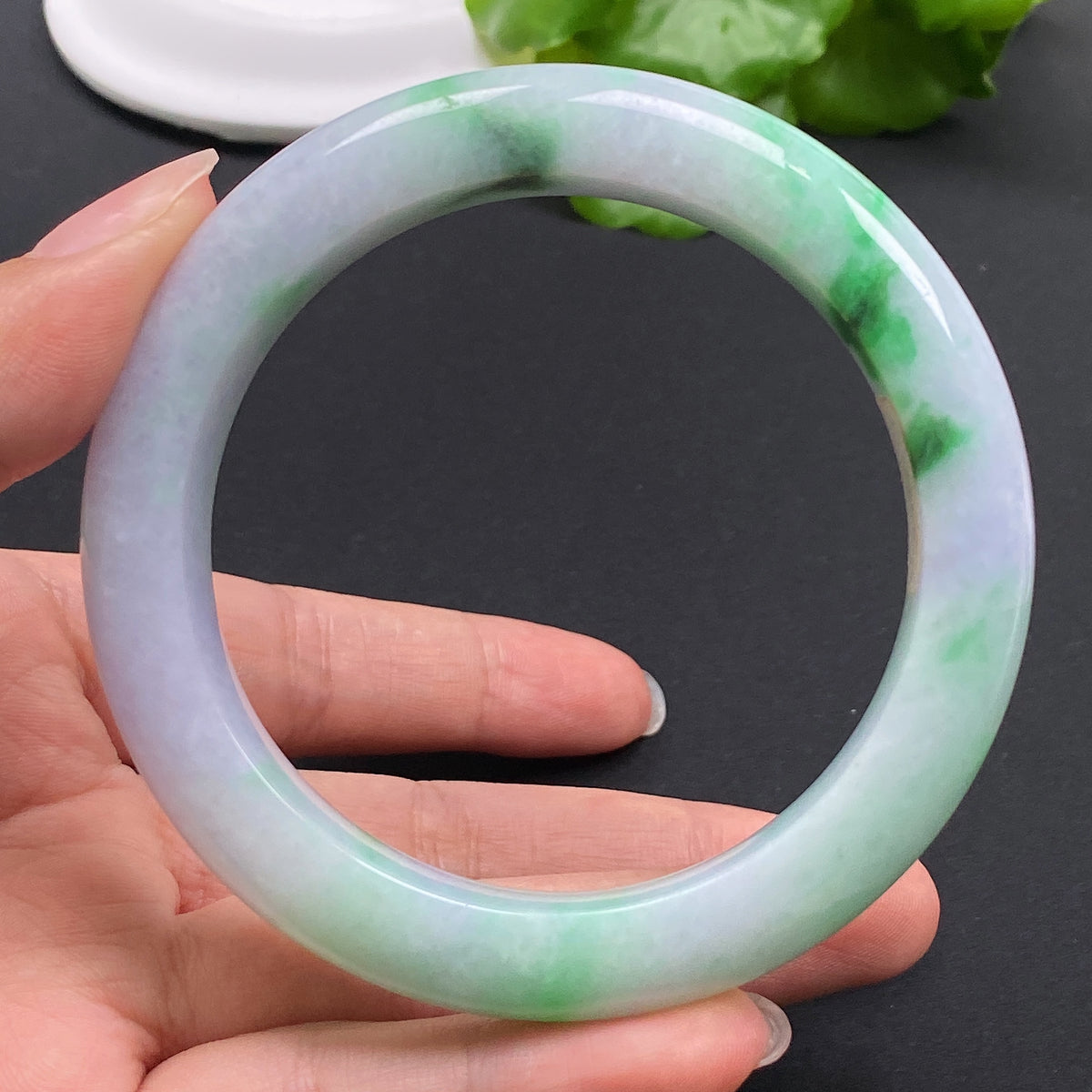 Jadeite round bracelet by HKHQ with size 57.9, featuring polished jade beads, weighs approximately 69.23g.