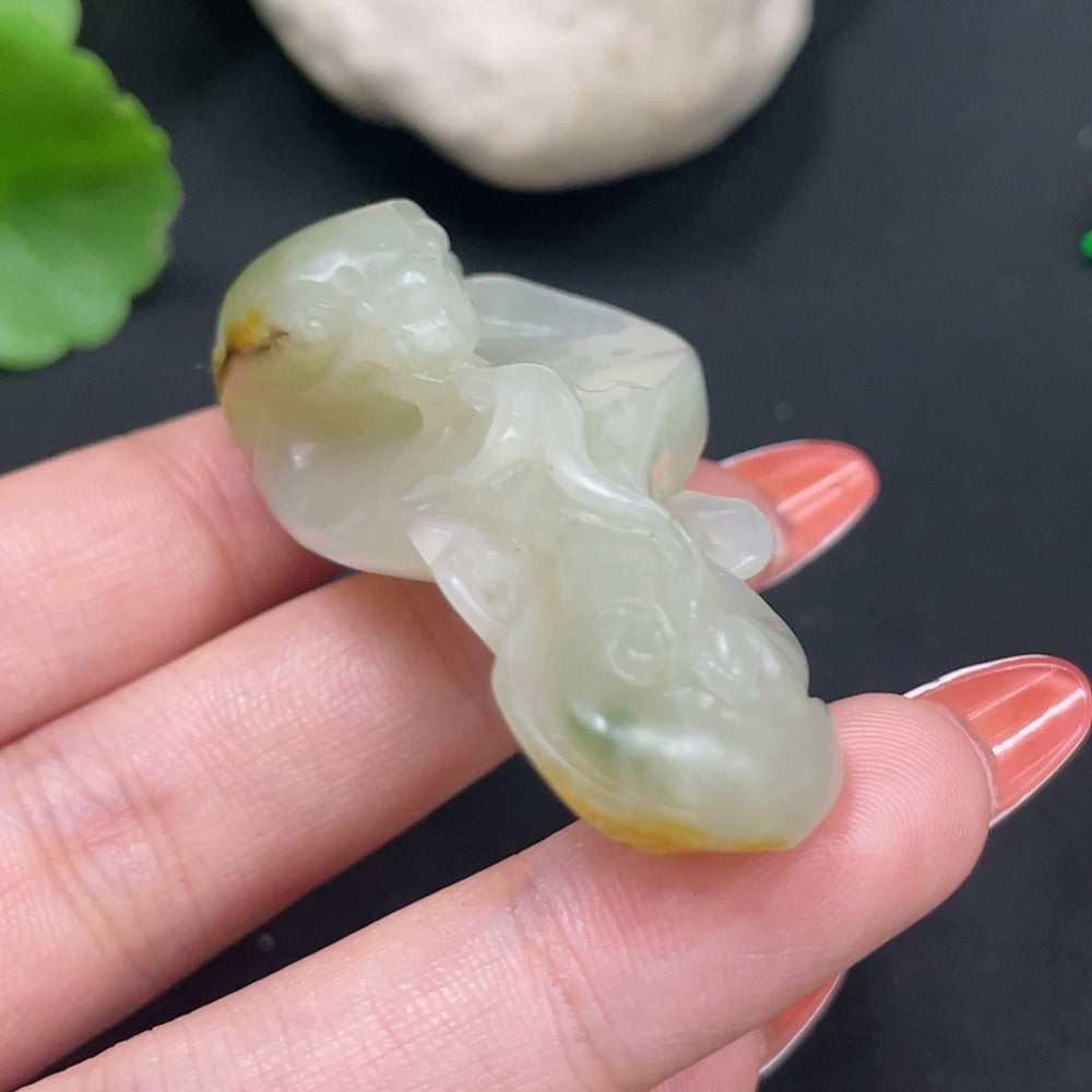 HKHQ Hetian Jade Pendant featuring an auspicious beast design with rope, certified by Huiliu, showcasing undetermined skin color origin.