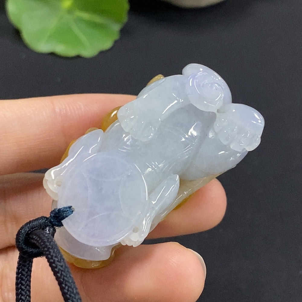 Jadeite Pixiu pendant made of green jade, weighing approximately 44.16g, featuring intricate carving and a polished finish.
