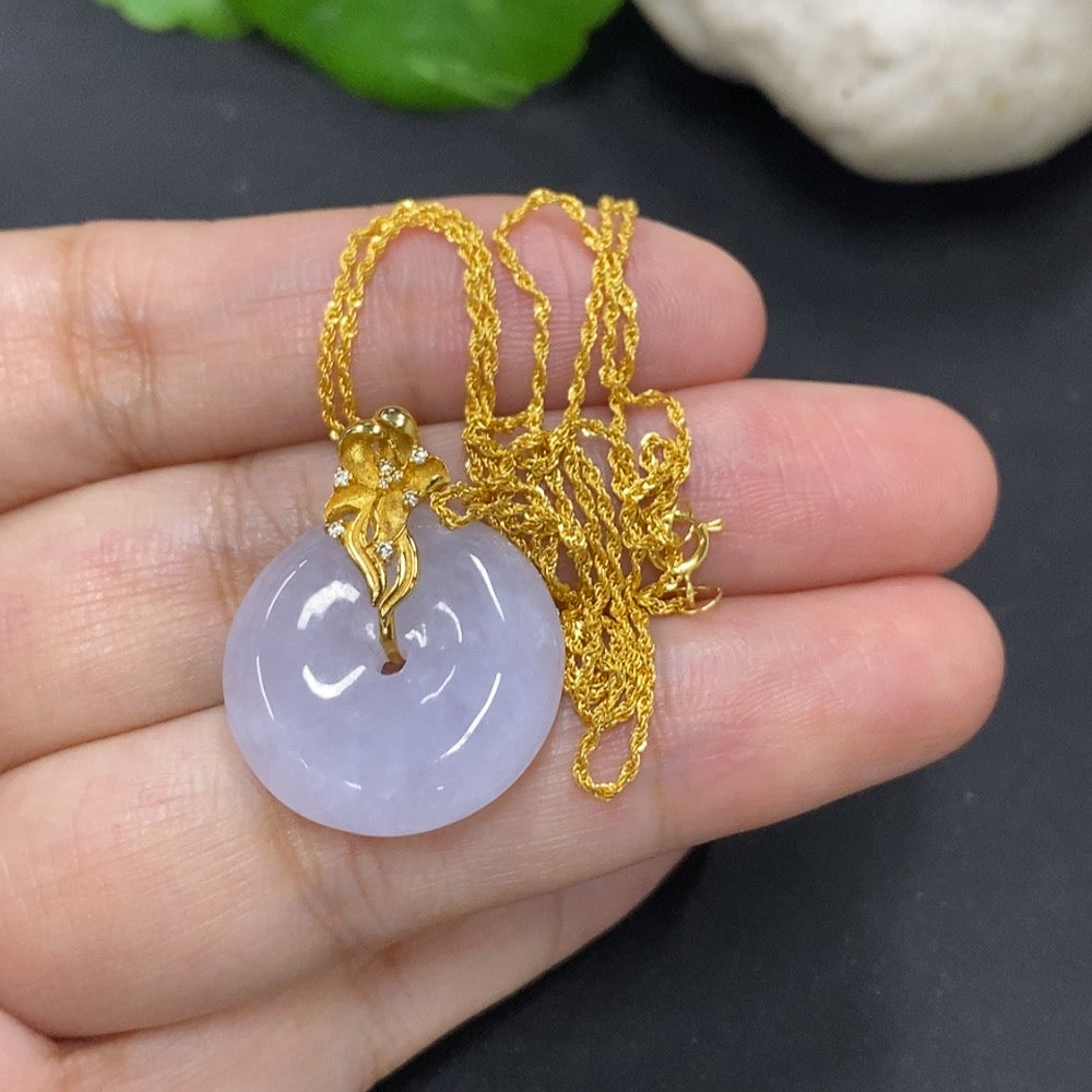 Jadeite Peace Knot pendant with 18k gold chain, HKHQ jewelry, detailed view of the jade pendant with gold accents.