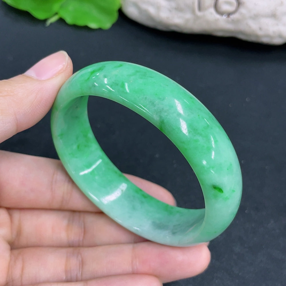 Jadeite concubine bracelet by HKHQ, featuring vibrant green jadeite beads, size 54.1/48.8, weighing approximately 49.57g.