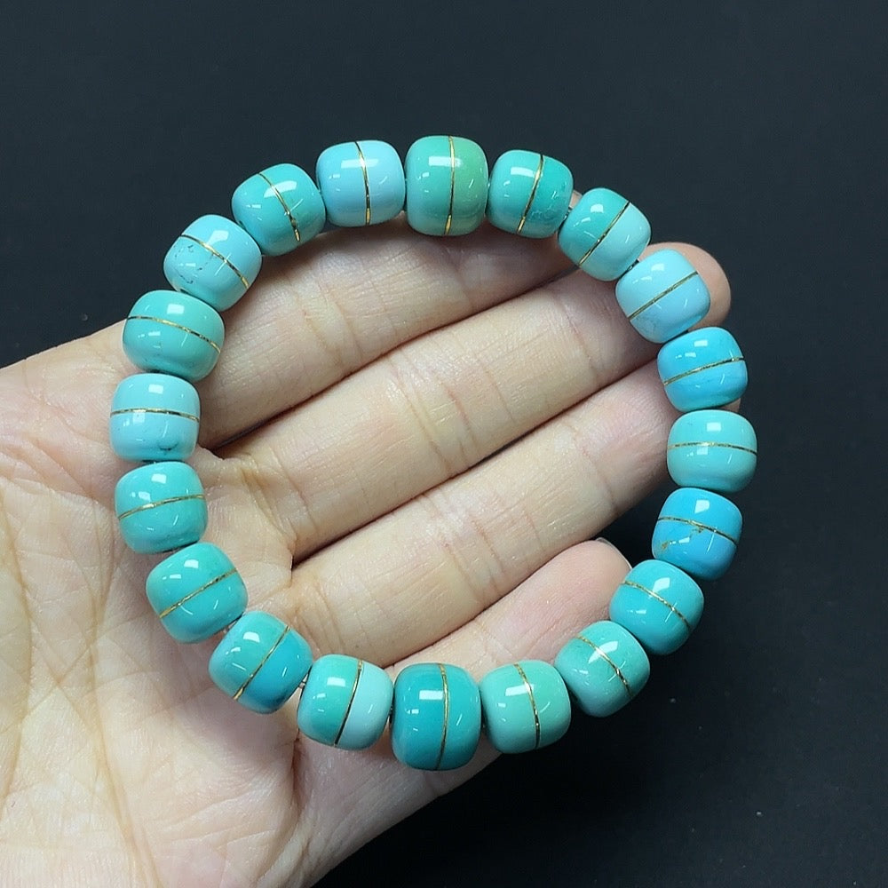 Turquoise gemstone bracelet with 37% gold content, stone inclusions, 8.9-10.7mm beads, weighing 26.98g, by HKHQ.