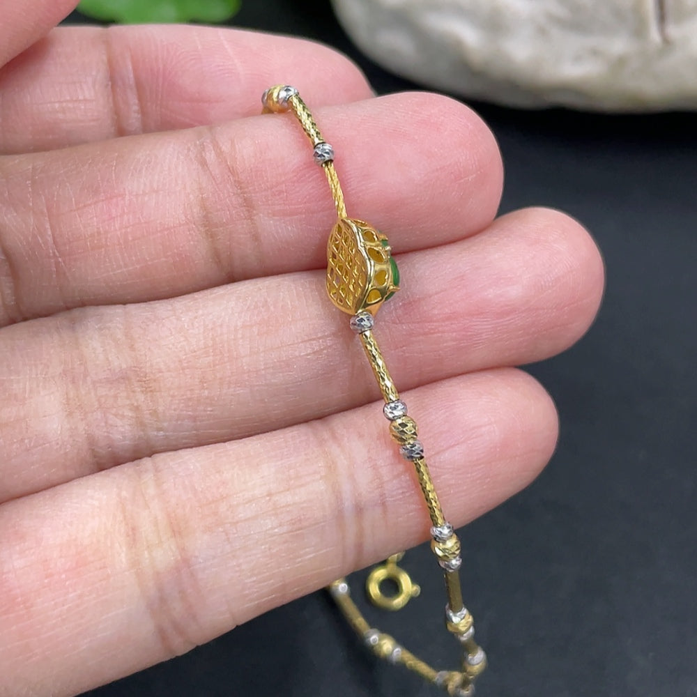 Jadeite gourd inlaid bracelet by HKHQ with 18k gold and diamond accents, delicate jewelry with elegant craftsmanship.