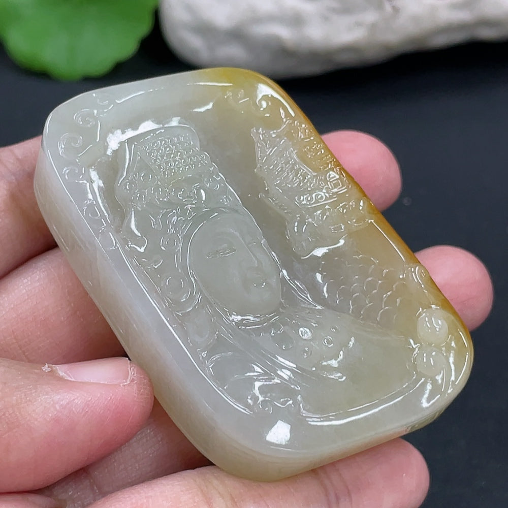 Jadeite Guanyin pendant from HKHQ, intricately carved, weighing approximately 64.7g, showcasing smooth, green jade craftsmanship.