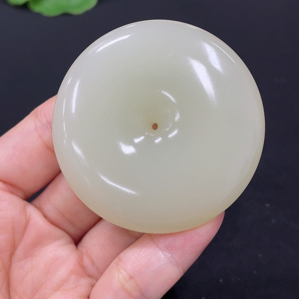 Hetian jade pendant with peace knot design, crafted from high-quality jade, weighing approximately 58.6 grams, by HKHQ.
