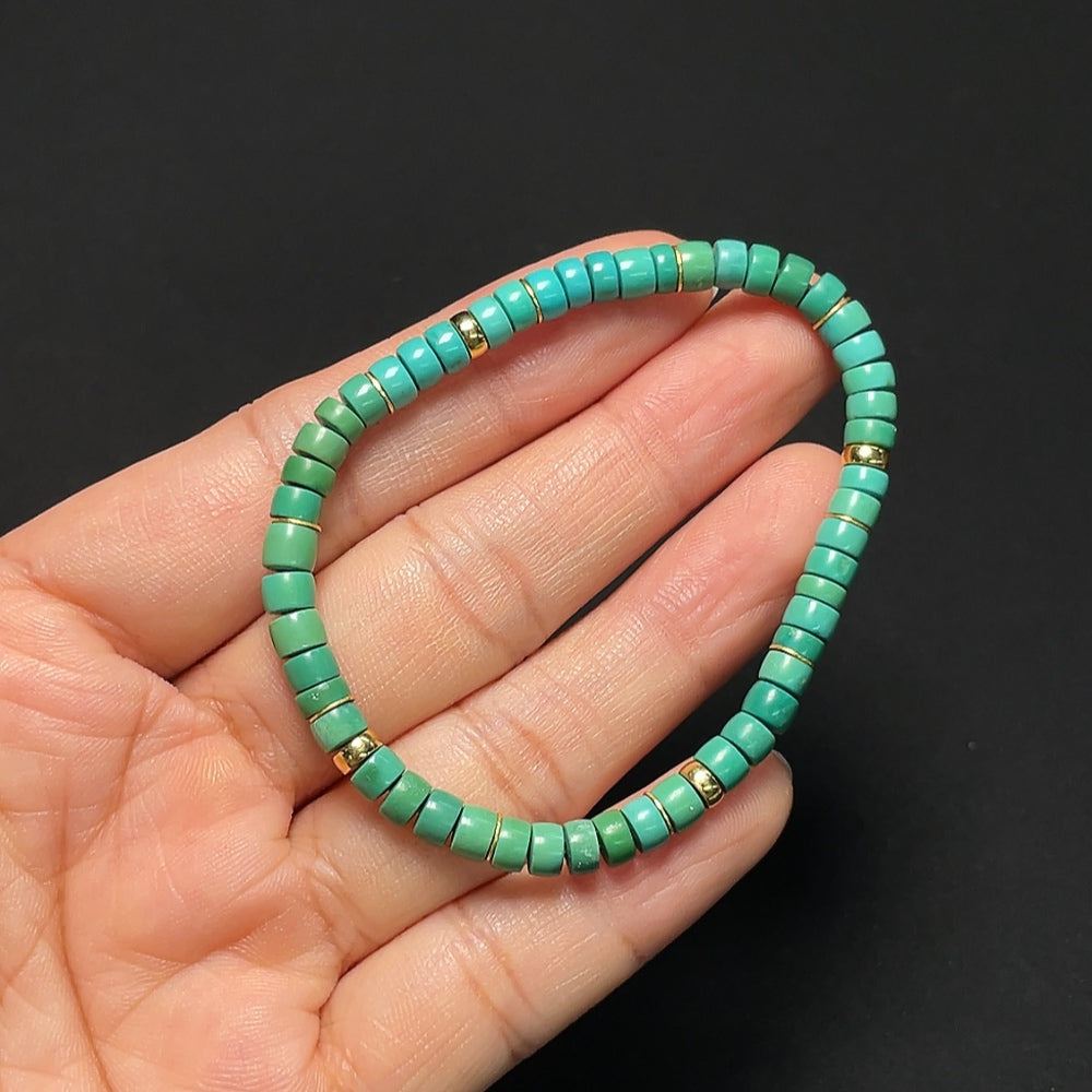 HKHQ 18K gold turquoise bracelet with 4.7mm beads, total weight approx. 7.02g, showcasing elegant jewelry design