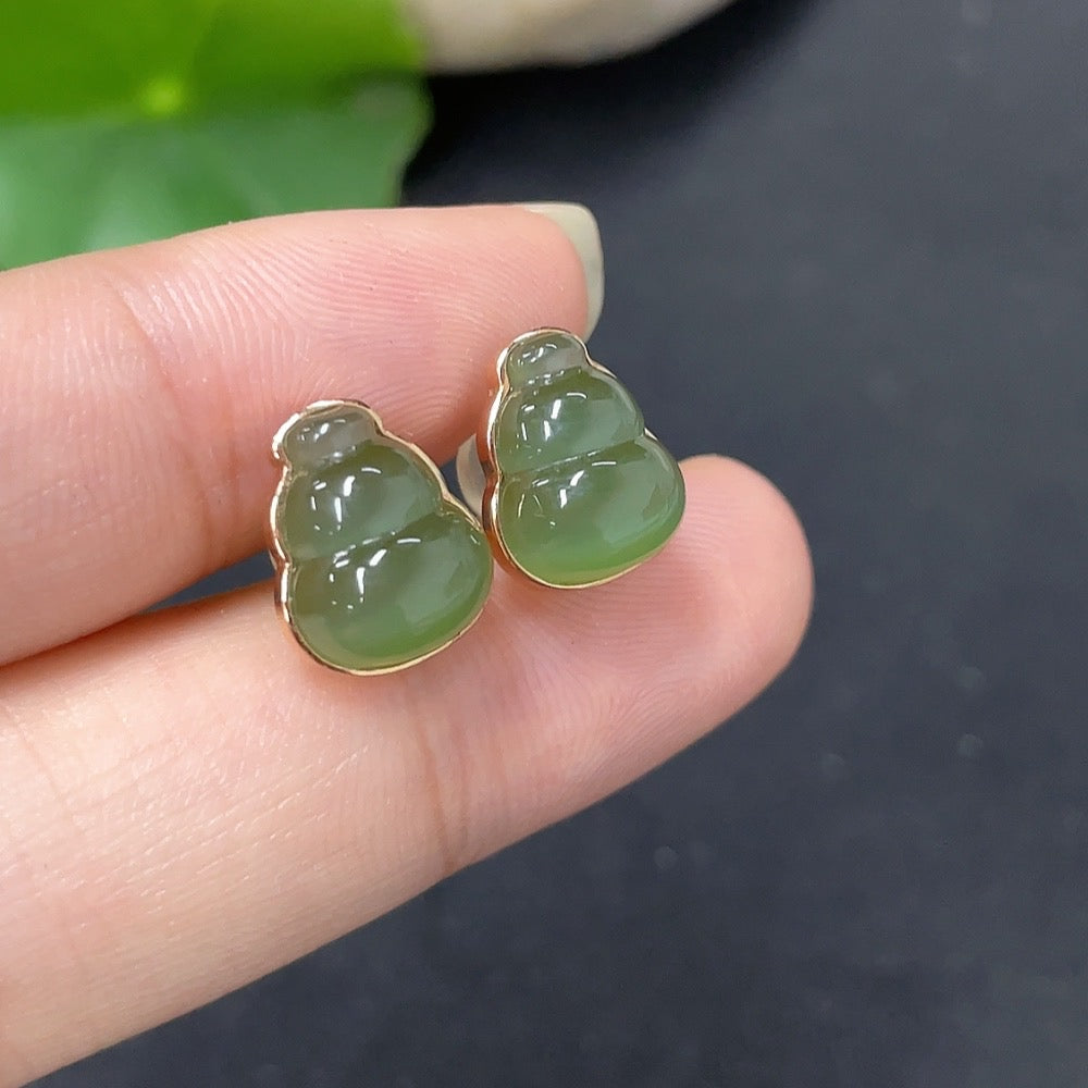 HKHQ Hetian jade inlaid earrings with 18k gold, featuring elegant jade stones and gold ear stoppers, total weight 2.2g.