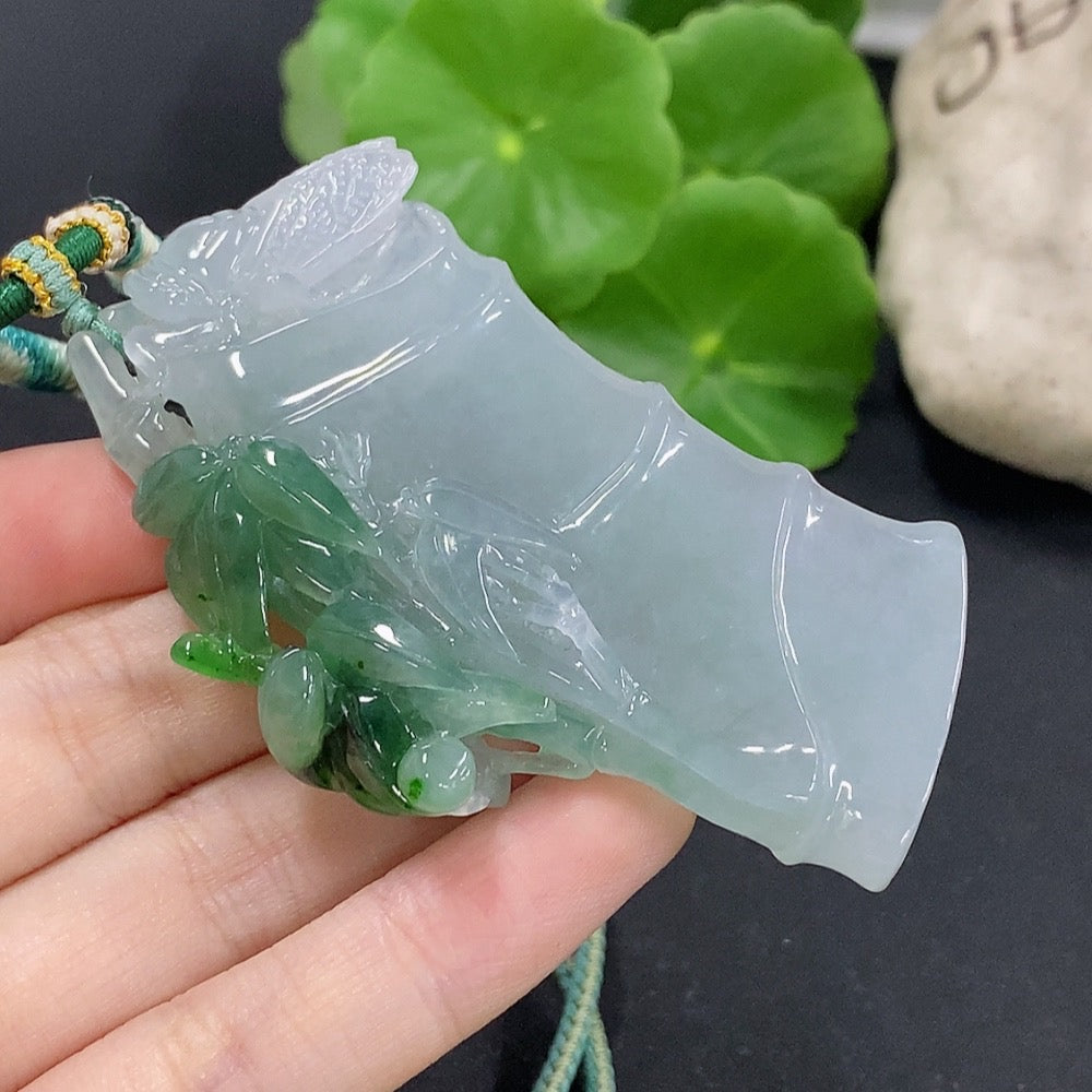 Jadeite bamboo pendant with mineral components, crafted by HKHQ, weighing approximately 59.89g, featuring natural jade and mineral details.