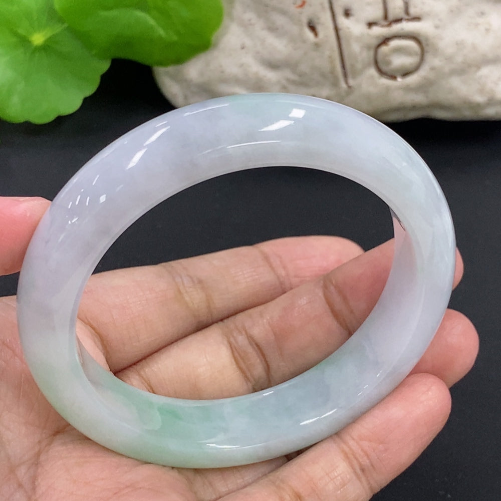 HKHQ jadeite round bangle in size 57.1 with a weight of 64.6g, showcasing smooth, polished jadeite bracelet design.