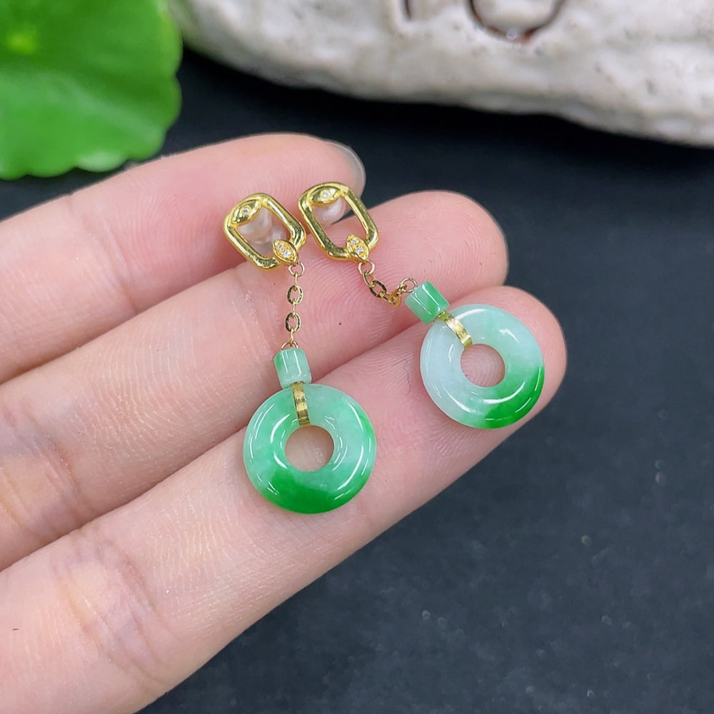 HKHQ jadeite earrings in 18k gold, lightweight approx. 1.5g, featuring smooth jade stones and elegant dangle design.