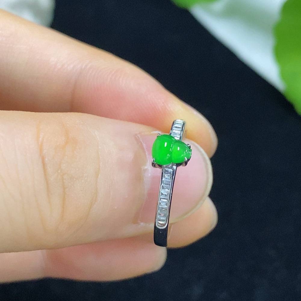 Huiliu Jadeite gourd-shaped ring with inlaid jade and diamond accents, featuring intricate craftsmanship and a polished finish.